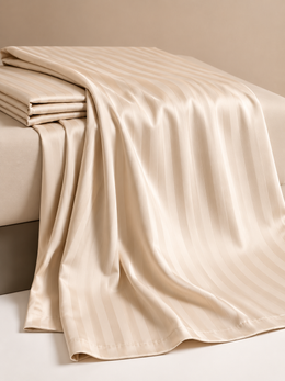 beige flat striped bed sheet 